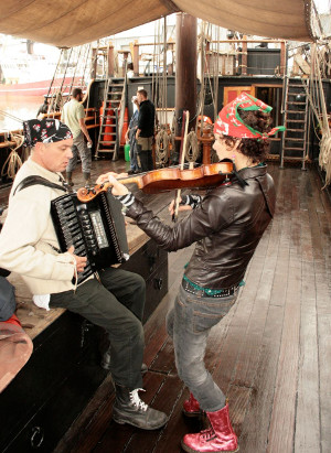 Fiddlebox making music on a ship
